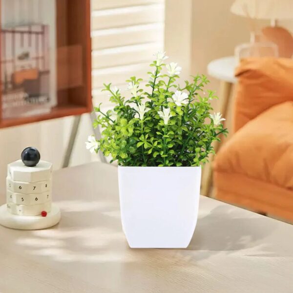 1a4d05c5-7551-44dc-a6ce-e9235d9d519d.faea414123c27aea0eb96d519f24ad82_converted.jpg Small Artificial Potted Plant with Flowers – Green