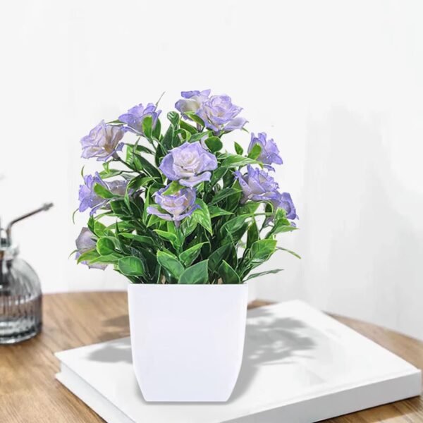 35580232-1ad4-48e0-828e-680a52e72fb9.8eb19e6ff46a9e8523bf23fbfb71a61d_converted.jpg Small Artificial Potted Plant with Flowers – Green