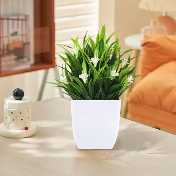 58ed7b06-c0a7-4ae9-9639-cdb798fbf3c3.97f208fd38911748b7d3837420ad8e66_converted.jpg Small Artificial Potted Plant with Flowers – Green