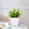 69d4099e-550b-4b50-8a37-6ce43c41fa1b.4f1034a3b7677b7063baeaefa7dd8dc8_converted.jpg Small Artificial Potted Plant with Flowers – Green