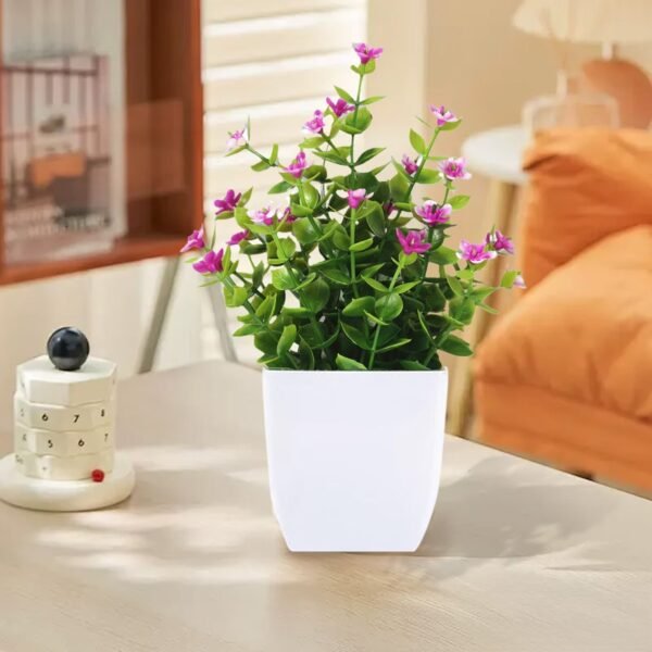8ef9f53d-db4d-41fe-a935-ed07e2365c16.d6dc3fcd48bc6bcb64418ac7664e7bf1_converted.jpg Small Artificial Potted Plant with Flowers – Green