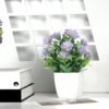 b848441b-4090-4995-adb6-5bc9f6f7f6a5.cfb0e52a2350c442730e8dadb5a81b7d_converted.jpg Small Artificial Potted Plant with Flowers – Green