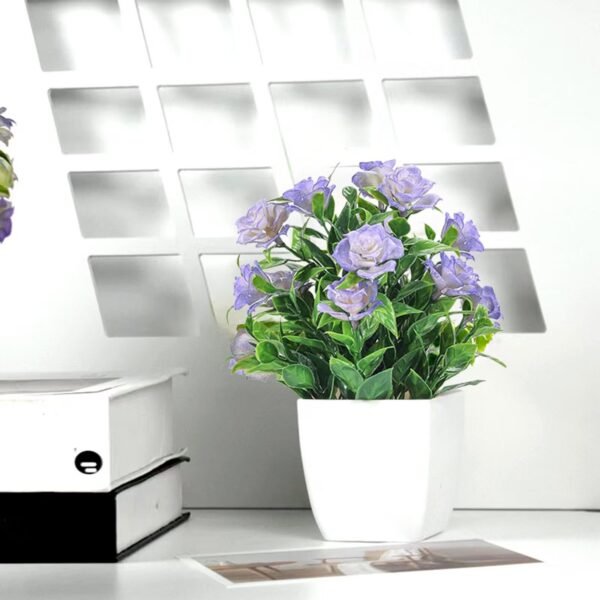b848441b-4090-4995-adb6-5bc9f6f7f6a5.cfb0e52a2350c442730e8dadb5a81b7d_converted.jpg Small Artificial Potted Plant with Flowers – Green